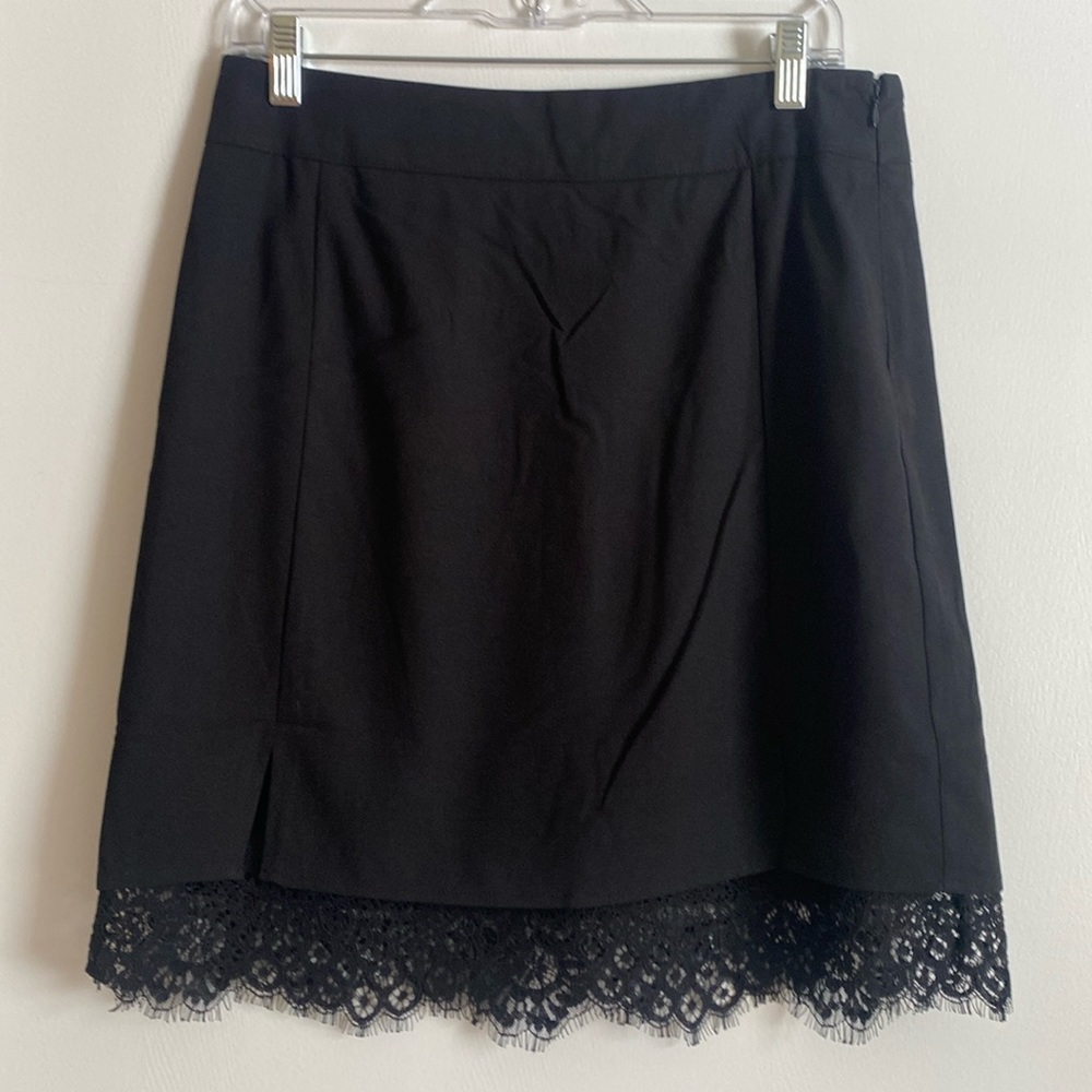 Hem & Thread size large black skirt. Just above the knee. Brand new.